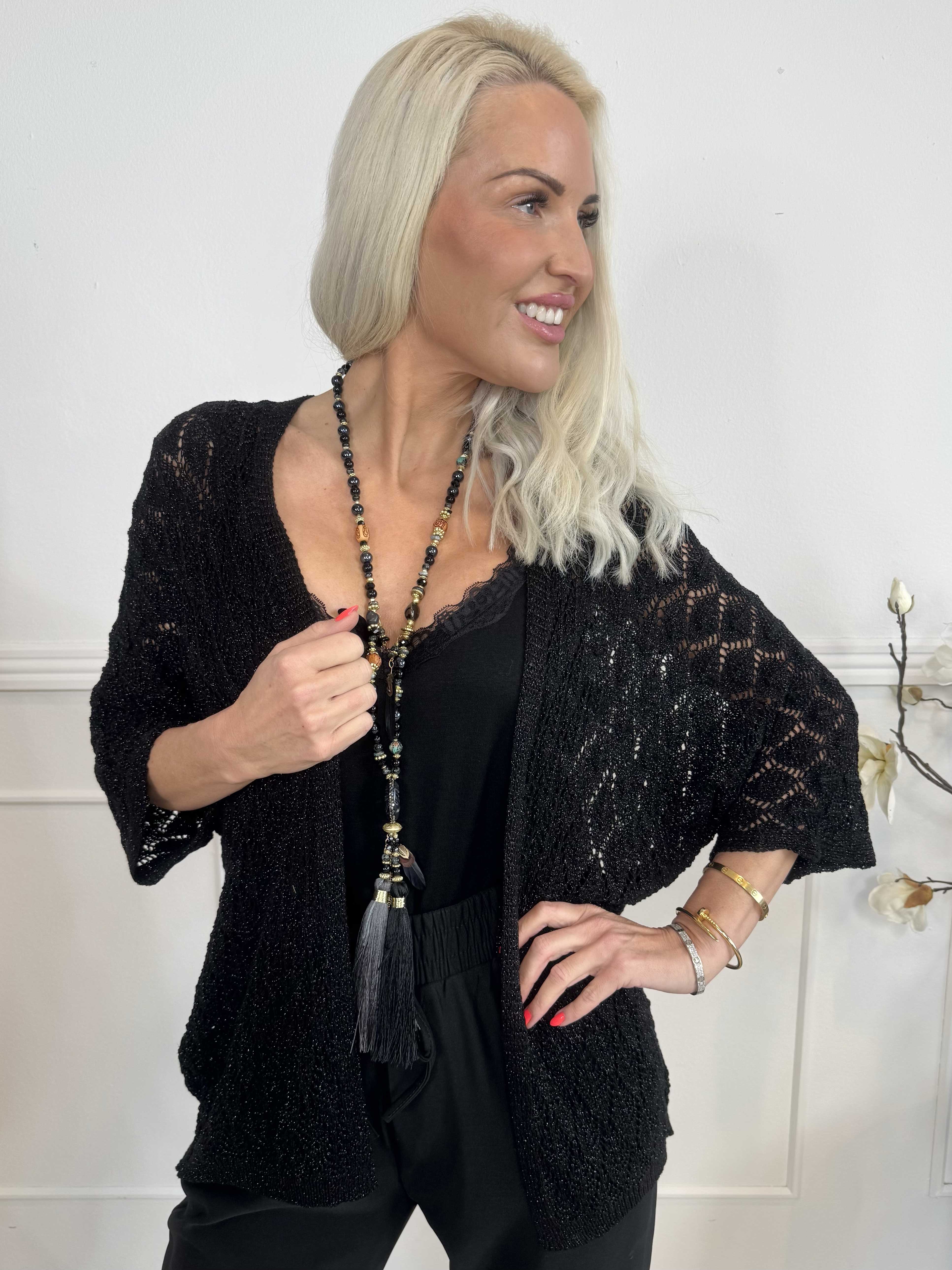 Selena - Söt virkad stickning med glittertrådar